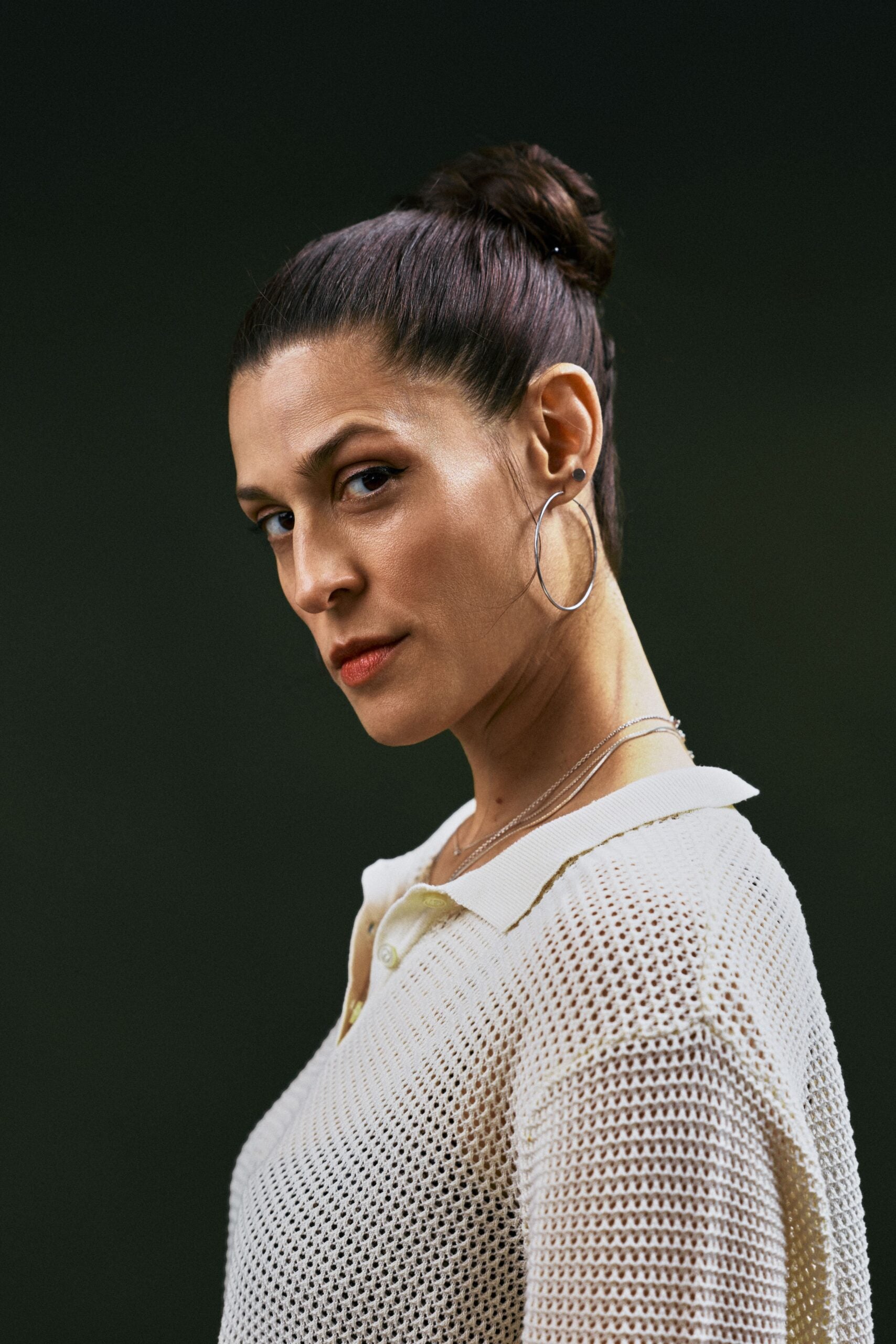 Dessa gazes mischievously at the camera